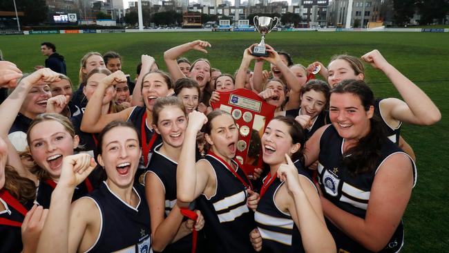 Caulfield Grammar players celebrate their feat winning the 2022 Herald Sun Shield. Photo: Dylan Burns/AFL Photos.