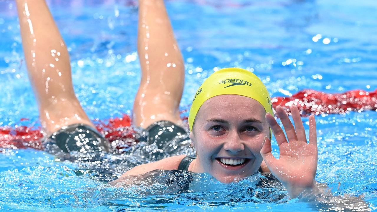 Australia's Ariarne Titmus celebrates winning to take gold.