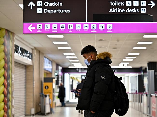 Passengers are seen at Edinburgh airport as the UK government tighten rules due to the spread of Omicron. Picture: Getty Images