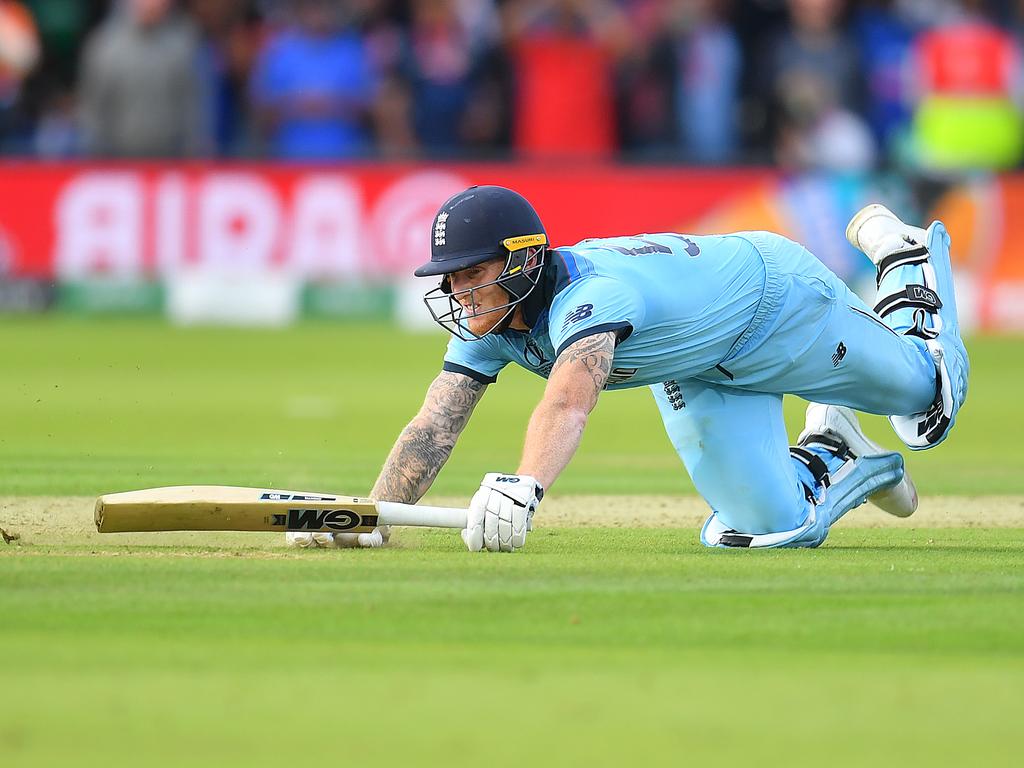 Ben Stokes dives to make his ground as the ball hits his bat and runs away to the boundary. (Photo by Clive Mason/Getty Images)