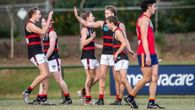 Old Xaverians celebrate a goal against Old Scotch. (Picture: VAFA)