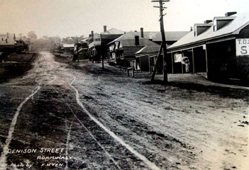 Washed under ... Denison Street in Old Adaminaby in undated copy photo. The old town was flooded in the late 1950s as part of the Snowy Mountains scheme.