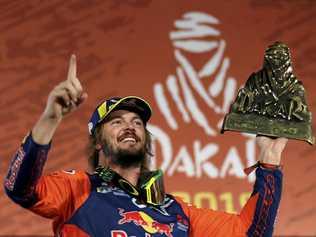 MAKE THAT TWO: Toby Price won his second Dakar Rally winner's trophy in Lima, Peru on Thursday, January 17. Picture: Martin Mejia