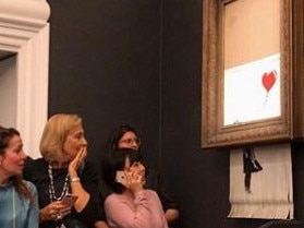 A photo of the destroyed painting uploaded to Banksy's instagram with the caption "going, going, gone..."