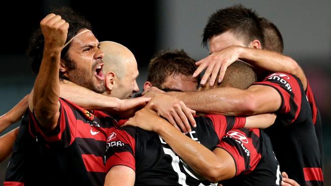 Nikolai Topor-Stanley screams after a Mark Bridge goal in 2012.