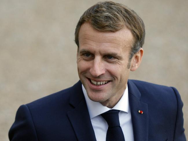 France's President Emmanuel Macron looks on as he welcomes his Columbia's counterpart at the Elysee Presidential Palace, in Paris, on November 3, 2021. (Photo by GEOFFROY VAN DER HASSELT / AFP)