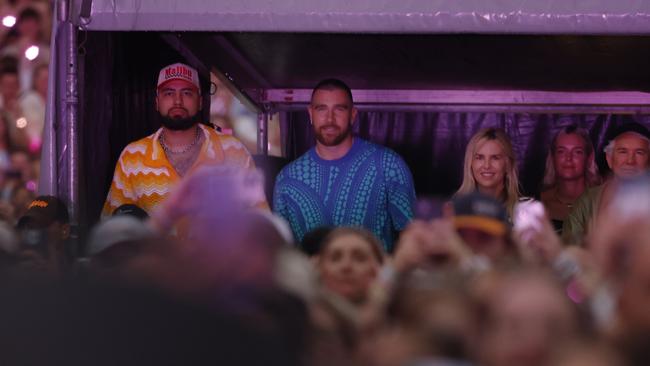 Pictured (centre blue shirt) is NFL star Travis Kelce watching his girlfriend Taylor Swift performing at Accor Stadium at Sydney Olympic Park on the opening night of the Sydney leg of her Era’s tour. Picture: Richard Dobson