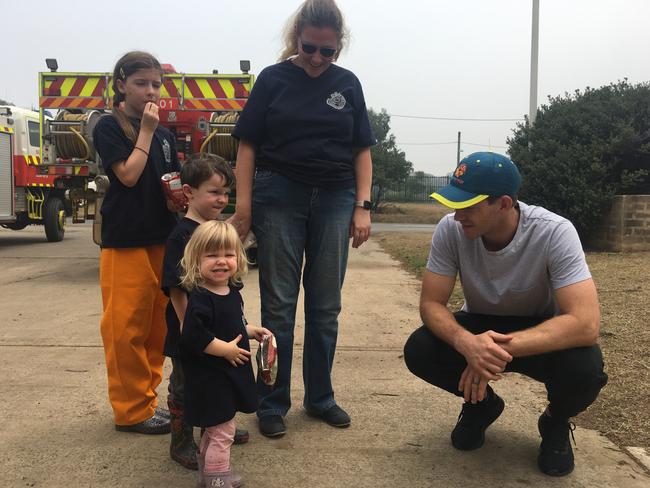 Tim Paine meets the families of RFS volunteers at Wingello. Picture: RFS