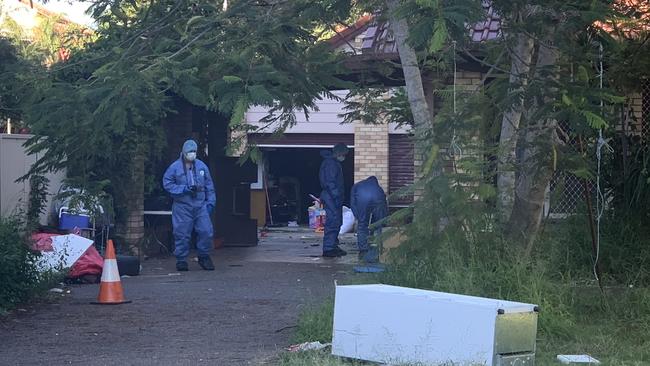 Police work at the scene of a suspicious death in Surfers Paradise.