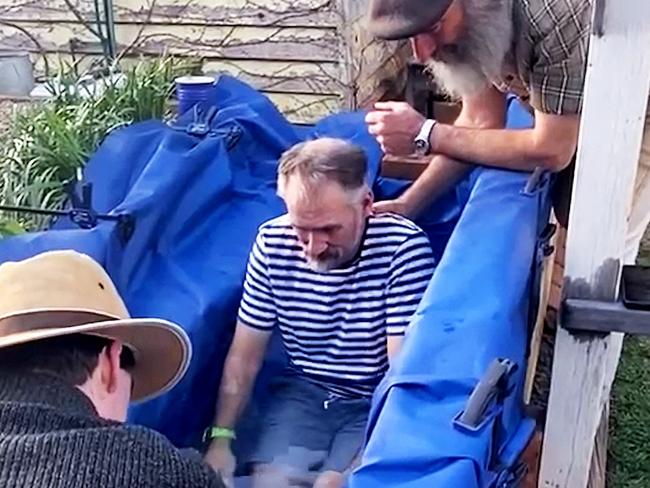 Jason Struhs being baptised.