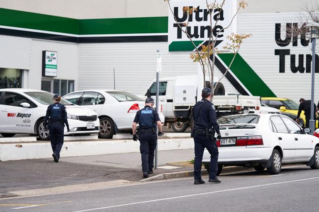 Police search surrounding streets for evidence. Picture: Matt Loxton