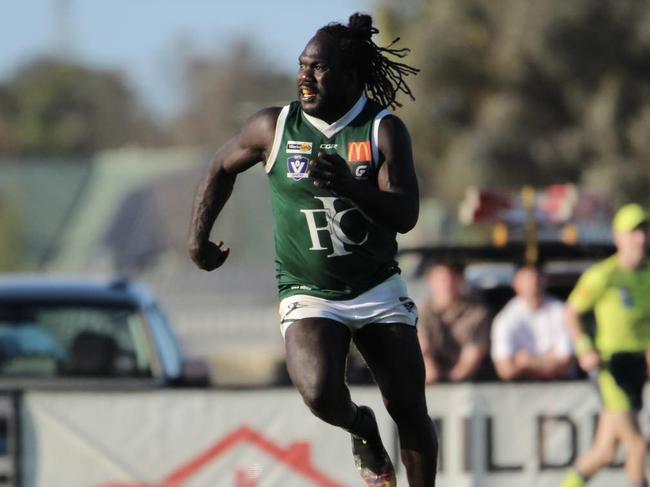 Anthony McDonald-Tipungwuti runs in the qualifying final.  Picture: Rita Morello.