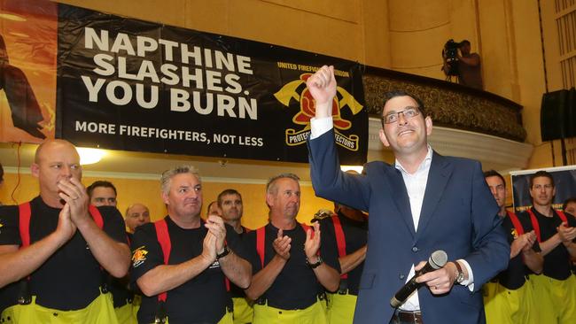 Daniel Andrews campaigning with firefighters at the Collingwood Town Hall in Melbourne in 2014. Picture: Hamish Blair