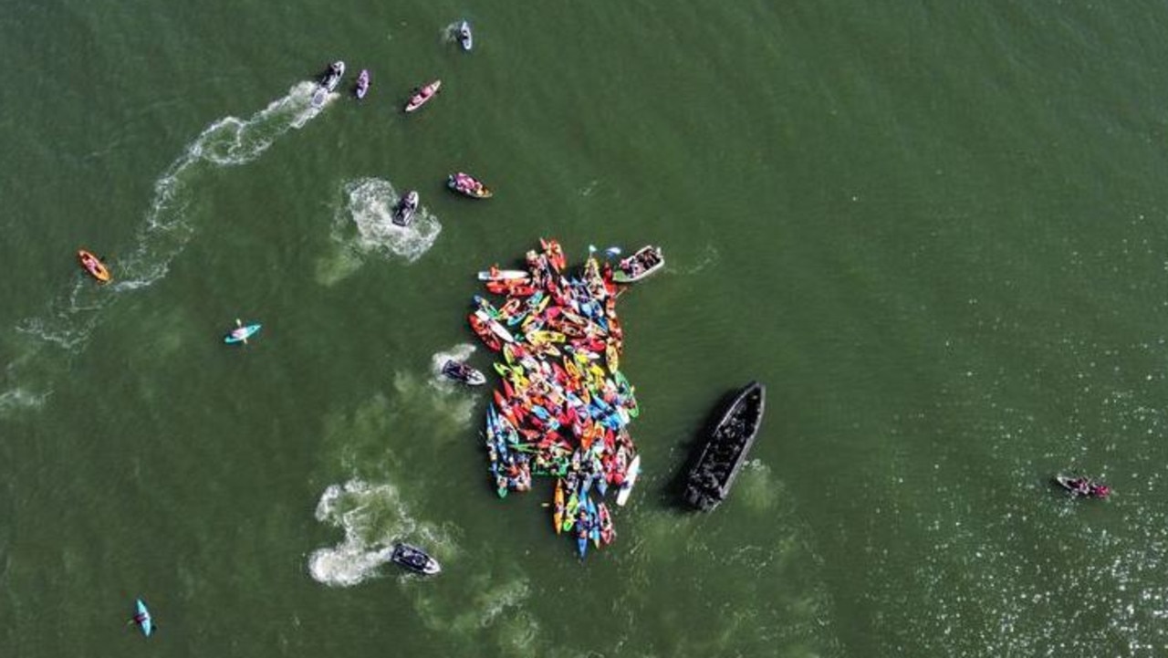 Dozens of climate change protesters have been removed from the water and arrested over a blockade at the Port of Newcastle. (Picture: Rising Tide)