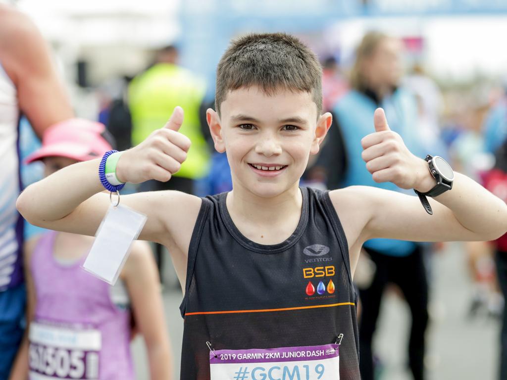 Aiden Kelly celebrates his win in the Two Kilometre Junior Dash. Picture: Tim Marsden.