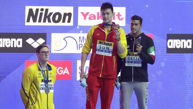 Australian swimmer Mack Horton refuses to join gold medallist Sun Yang on the podium after the 400m freestyle at the world swimming championships last year. Picture: AP