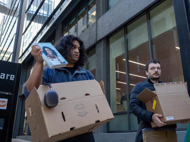 Former Twitter employees Rahul Ligma (L), software engineer, and Daniel Johnson outside Twitter headquarters after being laid off in San Francisco. Picture: AFP