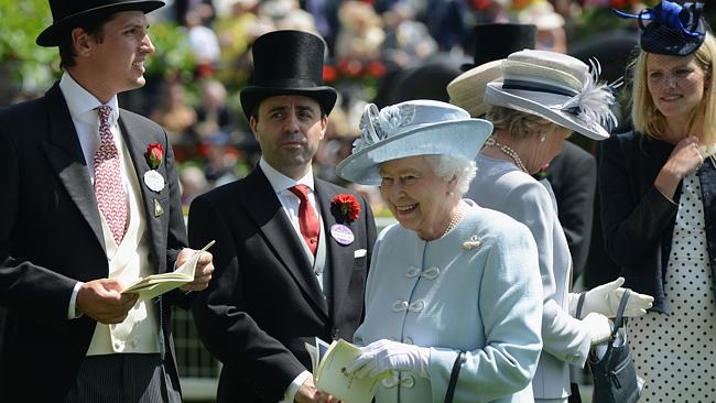 Queen Elizabeth II studies the form during day one of the Royal Ascot meeting.