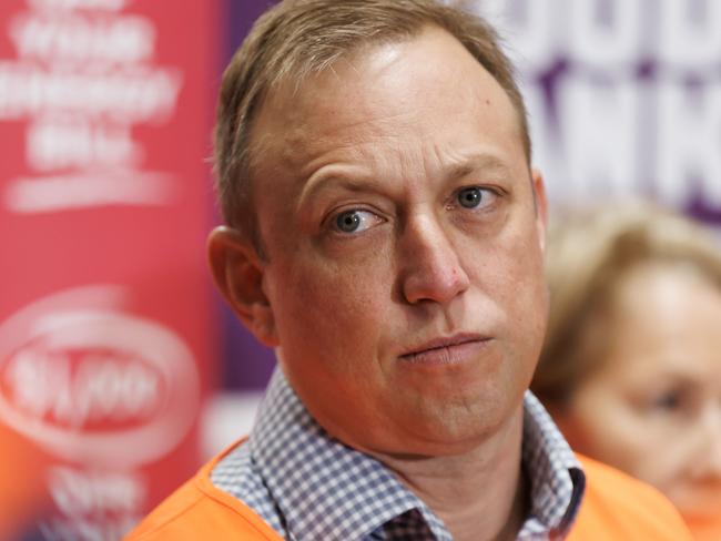 Premier Steven Miles addresses the media at Foodbanks warehouse facility at Morningside on Sunday morning. Picture Lachie Millard