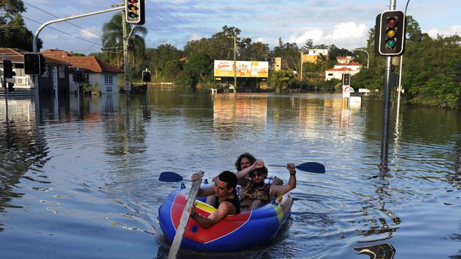 Residents and onlookers took to the flood waters, in all manner of water craft, in the inundated suburb of Rosalie in Brisbane on Thursday, January 13, 2011.