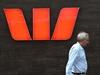 A pedestrian walks past a Westpac Bank in Sydney