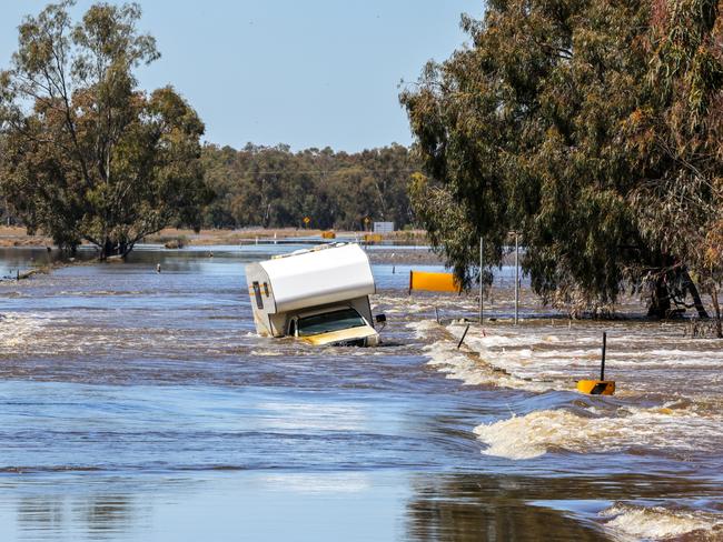 A vehicle overwhelmed by floodwaters in Condobolin in NSW’s central west. Picture: Toby Zerna/Office of NSW Premier