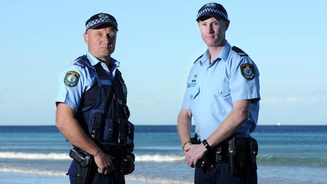 Senior constables Craig Hansen (left) and Craig Hansen saved three children from drowning at Caves Beach. Picture: Simon Bullard