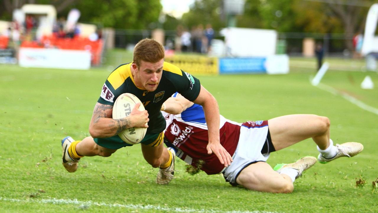 Wattles five-eighth Brodie Ciesiolka scores a try against Dalby in the TRL A grade grand final at Clive Berghofer Stadium. Sunday, September 27, 2015 Toowoomba photographer, Paul Ellison at the rugby league grand final Photo Contributed