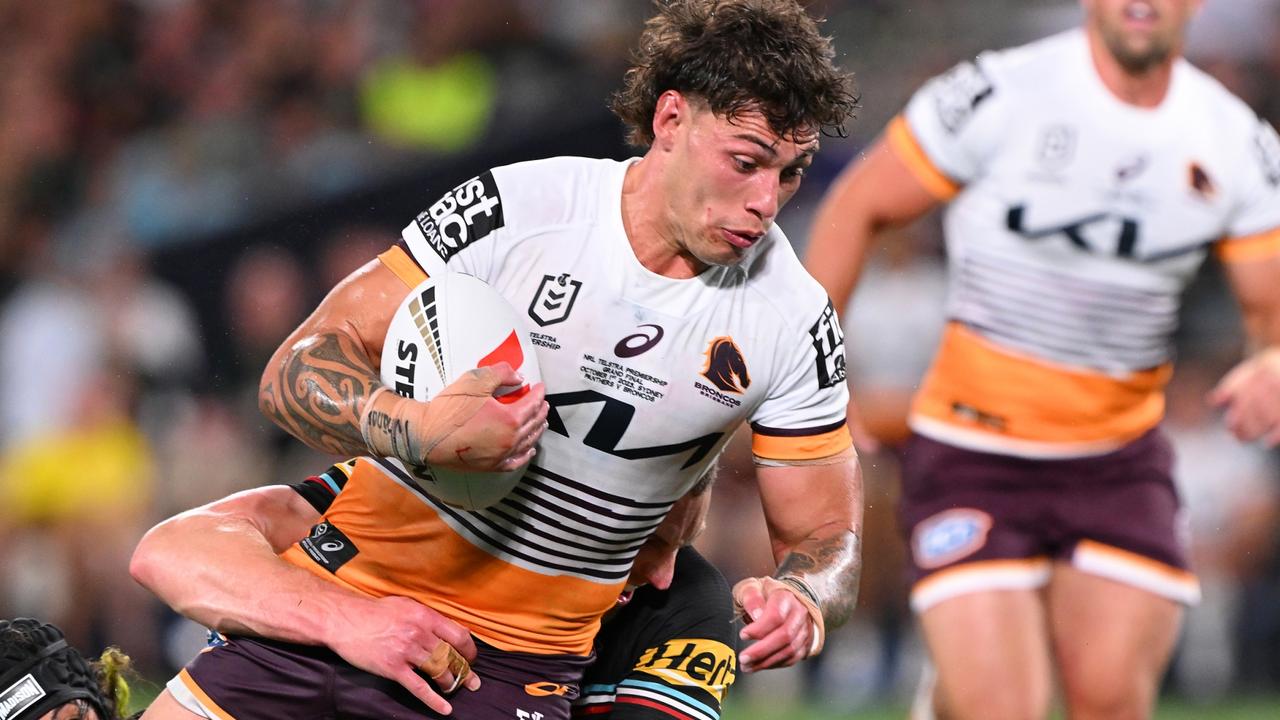 SYDNEY, AUSTRALIA - OCTOBER 01: Jordan Riki of the Broncos is tackled during the 2023 NRL Grand Final match between Penrith Panthers and Brisbane Broncos at Accor Stadium on October 01, 2023 in Sydney, Australia. (Photo by Bradley Kanaris/Getty Images)