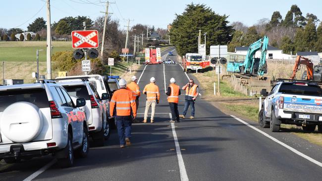 A Victorian man has died after an excavator he was driving rolled at Evandale, Tasmania, 20/07/2022, while he was performing subcontracting work for TasRail. Picture: Alex Treacy