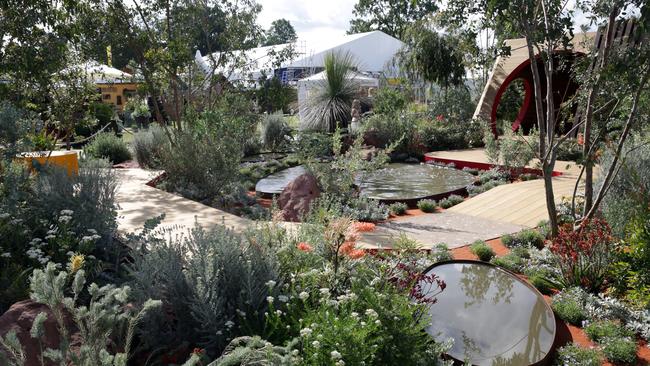 London, UK. 07 July 2014. Australian garden "Essence of Australia" featured at the RHS Hampton Court Flower Show with gardener Jim Fogarty and his daughter Lilly, 6. Pic Ella Pellegrini