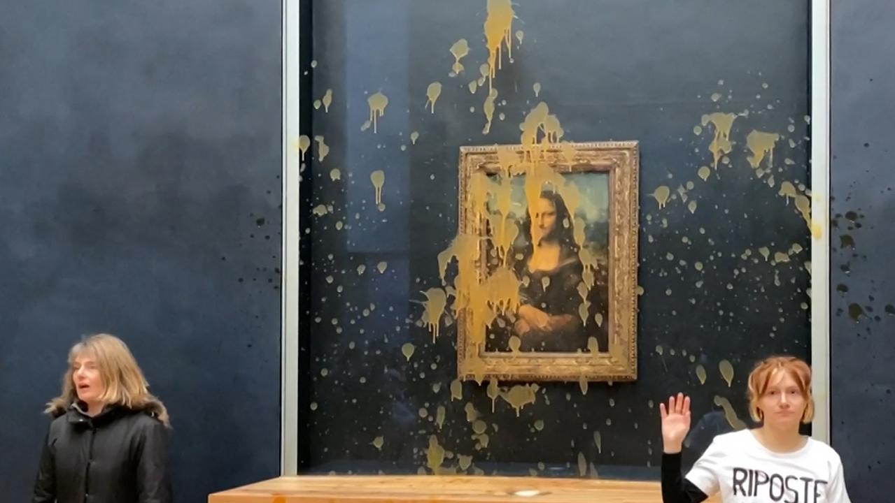 Environmental protesters hurl soup at Mona Lisa at the Louvre | The ...