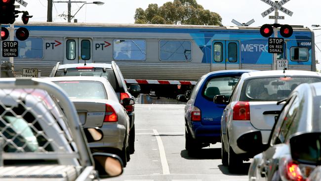 The boom gates at Buckley St are down for more than half of morning peak time. Picture: Mark Wilson