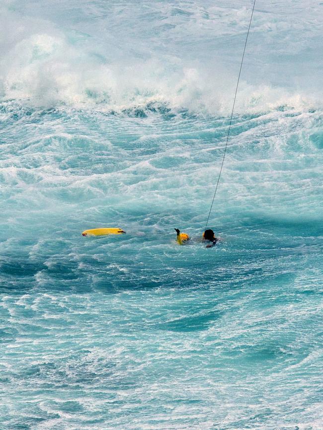 Two were rescued from the treacherous waters of Port Campbell. Picture: Ian McCauley