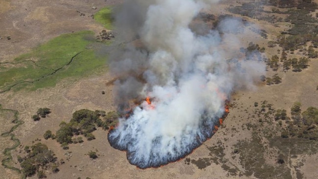 A photograph taken by aircrew on-board a Defence helicopter responsible for starting the Orroral Valley fire, just moments after it was accidentally lit. Supplied to ABC by Department Of Defence.