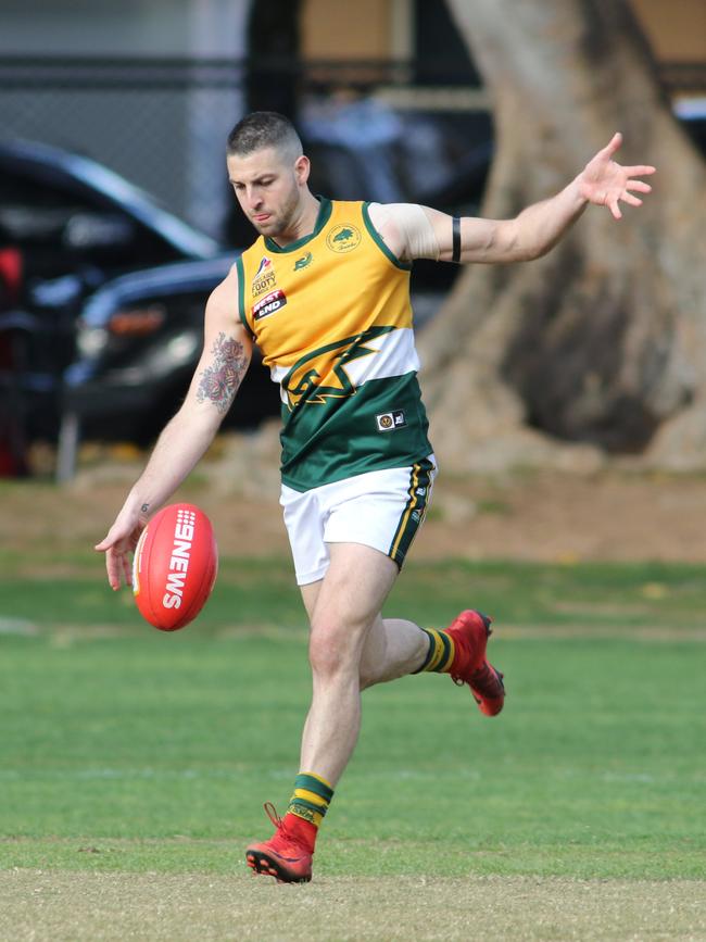 Matthew Sharpe gets a kick away for Salisbury North last season. Picture: AAP/Russell Millard