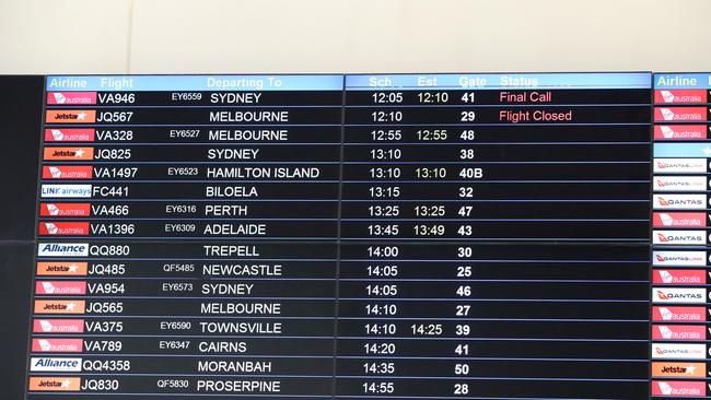 Departure sign at Brisbane Airport including a flight to Melbourne ahead of lockdown, Brisbane Airport. Picture: Liam Kidston