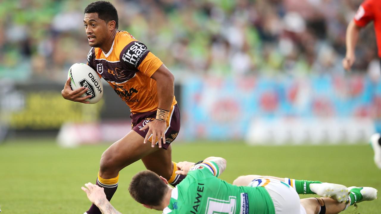 Anthony Milford looks to burst through a John Bateman tackle. Picture: Mark Kolbe/Getty Images