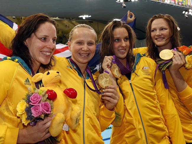 (L-R) Alicia Coutts, Melanie Schlanger, Brittany Elmslie and Cate Campbell of Australia pose with their gold medals after winning in the women's 4x100m Freestyle Relay Final during the Swimming competition held at the Aquatics Center during the London 2012 Olympic Games in London, England, 28 July 2012. EPA/PATRICK B. KRAEMER