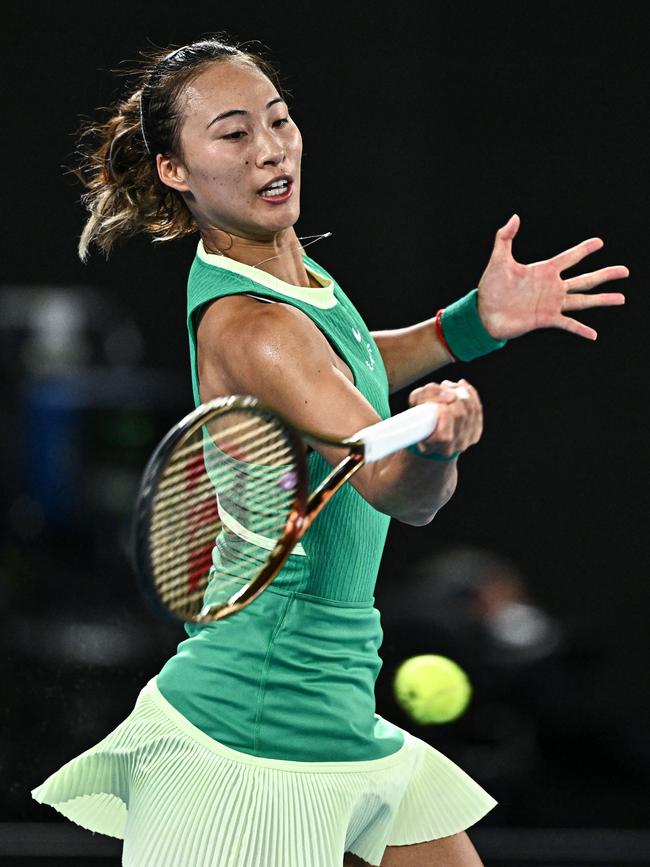 Destiny: China's Zheng Qinwen hits out during her semi against Dayana Yastremska. Picture: AFP