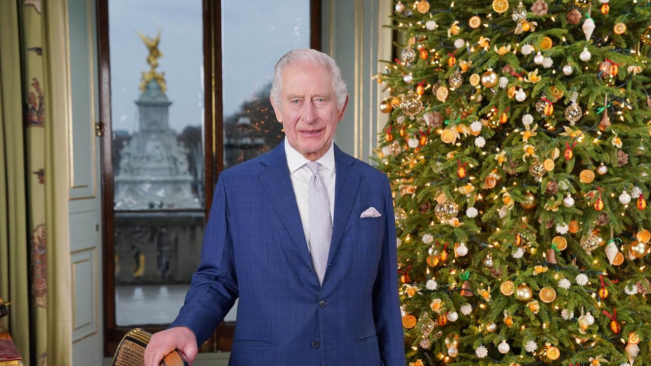 King Charles III poses in front of the living Christmas tree. Picture: WPA Pool /Getty Images