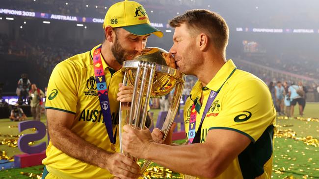 Glenn Maxwell and David Warner celebrate with the trophy. Picture: Getty Images