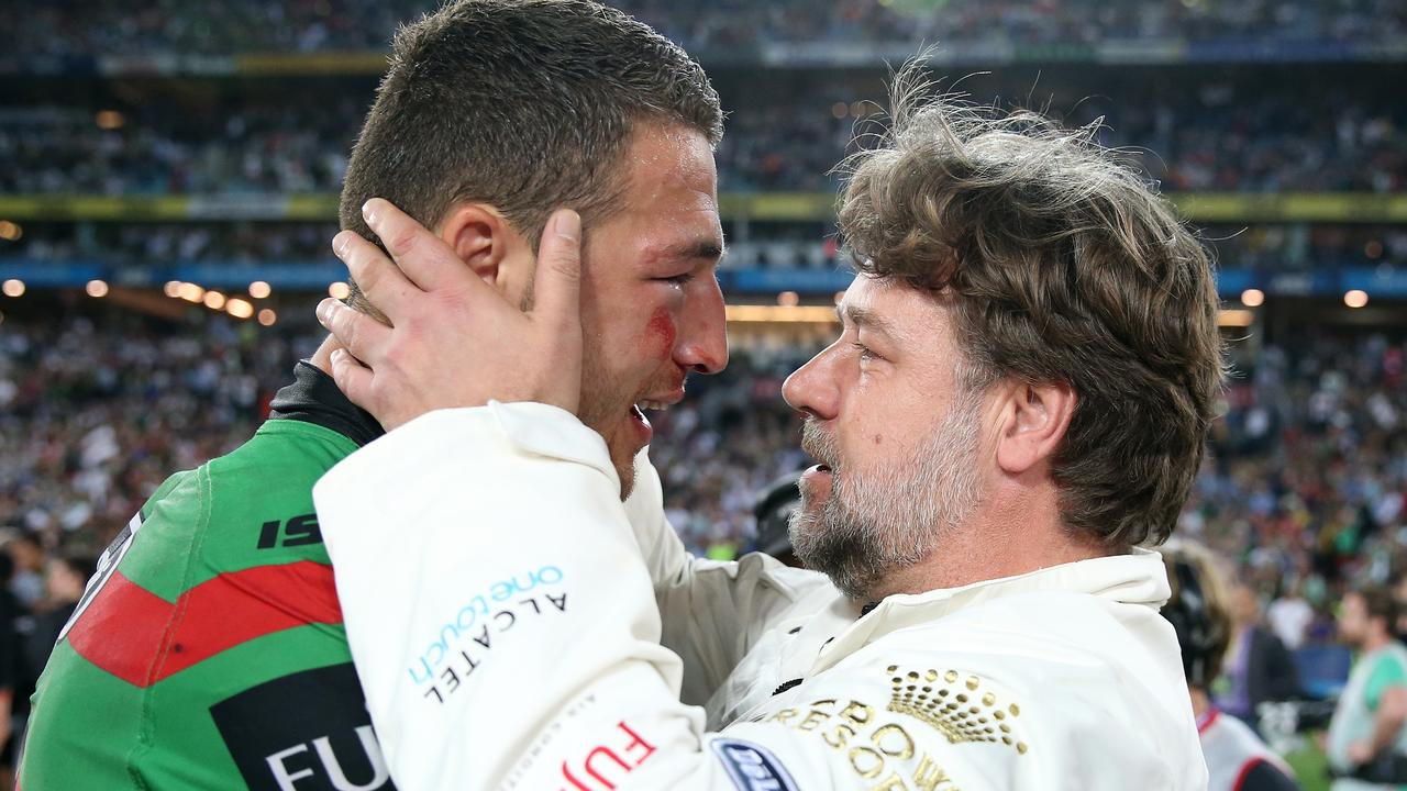 Russell Crowe with Sam Burgess after the team wins the 2014 NRL Grand Final.