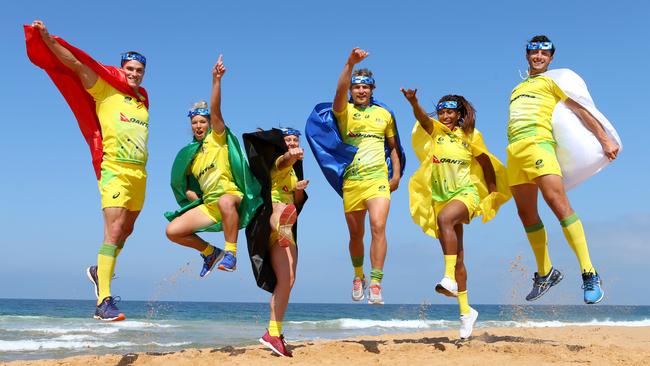 Representatives from Australia’s men and women’s sevens teams at Narrabeen Beach. Picture: Jason McCawley