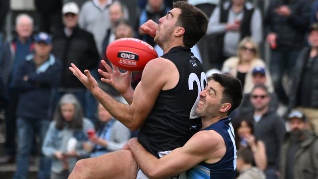 Scott Lycett from Port District battles against Glenunga in the division one Adelaide Footy League grand final at Norwood Oval. Picture: Brenton Edwards