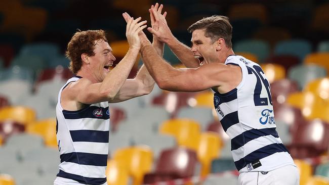 AFL Round 11. St Kilda vs Geelong at the Gabba, Brisbane.  10/08/2020.  Tom Hawkins of the Cats celebrates his goal in the fourth quarter with Gary Rohan   . Pic: Michael Klein