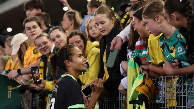 The Matildas’ popularity is clear to see as Mary Fowler signs autographs for young fans after beating the Korea Republic in an international friendly in Newcastle in April.