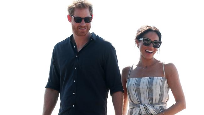 Prince Harry, Duke of Sussex and Meghan, Duchess of Sussex walking along Kingfisher bay walk about on October 22, 2018 in Fraser Island, Australia. Picture: Getty