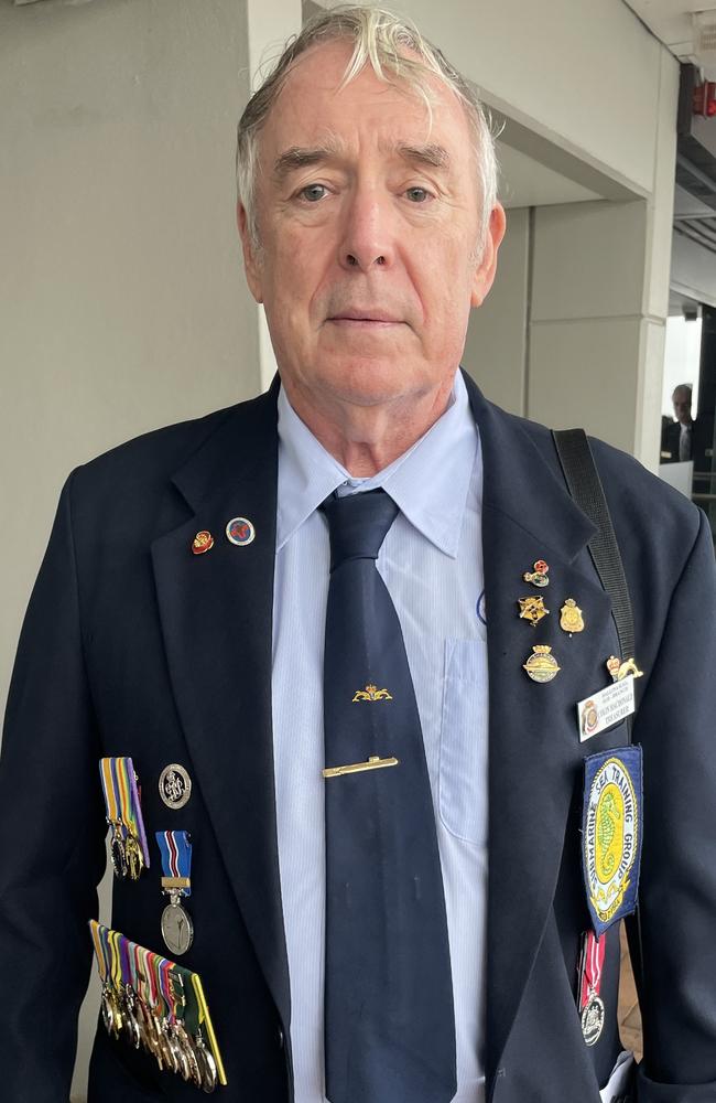 Ballina RSL Sub-Branch Treasurer Colin MacDonald on a drizzly Anzac Day in the town. Picture: Gianni Francis