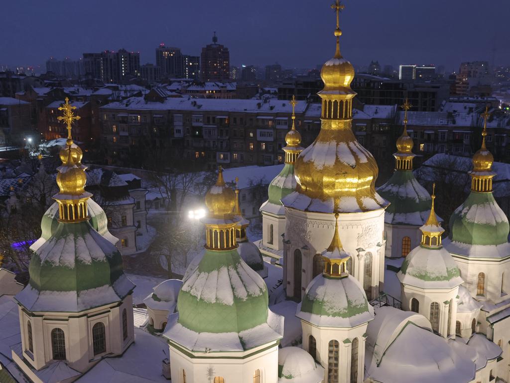 KYIV, UKRAINE - JANUARY 23: Saint Sophia Cathedral, whose origins date to the 11th century under Kyivan Rus, stands illuminated on January 23, 2022 in Kyiv, Ukraine. Tens of thousands of Russian troops have amassed on Ukraine's borders, causing international fears of a possible Russian military invasion. While Russian diplomats have denied any such intent, Russian President Vladimir Putin has said in the past that he sees Kyiv and its Kyivan Rus heritage as intrinsic to Russian cultural heritage. Kyivan Rus united East Slavic, Finnic and Baltic peoples in a federation from the 9th to 13th centuries. Belarus, Russia and Ukraine all refer to Kyivan Rus in their national heritage. (Photo by Sean Gallup/Getty Images)